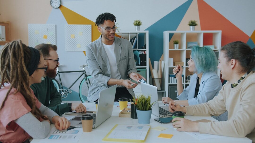 Diverse business team having a meeting around a table in a modern office