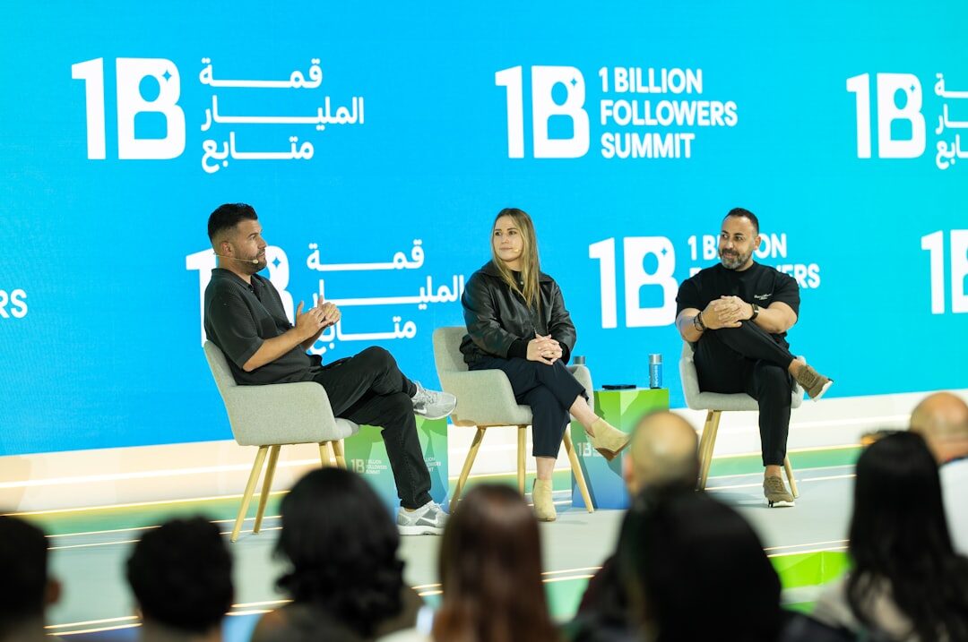 business summit stage with speakers